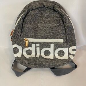 Adidas small grey backpack purse.